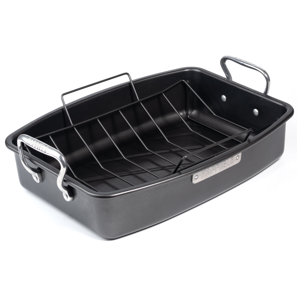 Black roasting pan with rack on a white background